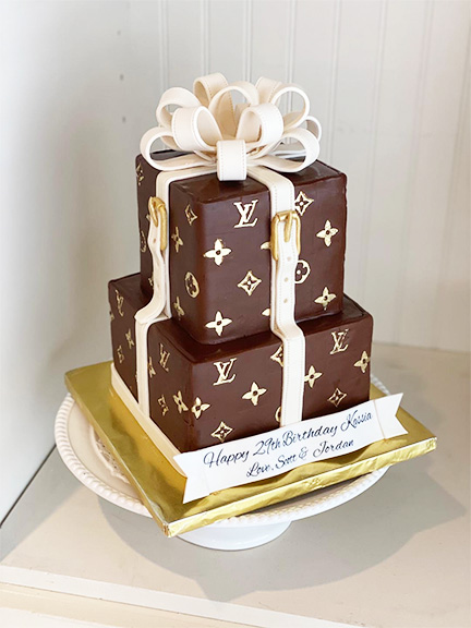 Louis Vuitton themed vanilla cake with vanilla buttercream. Loved
